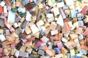 Small pieces of colored glass for the composition of the mosaics photo