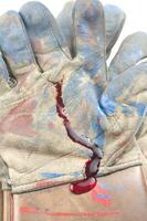 a glove with blood on it photo