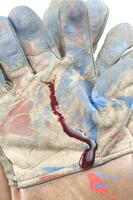 a glove with blood on it photo