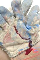 a glove with blood on it photo