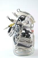 a glass jar filled with wires photo