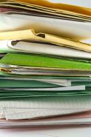 Stack of practices to be processed in the office photo