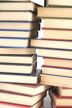 a stack of books on a white background photo