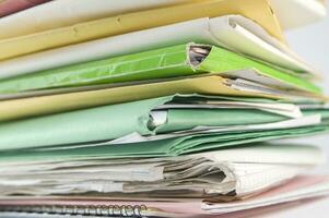 Stack of practices to be processed in the office photo