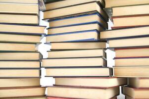 a stack of books on a white background photo