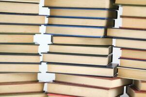 a stack of books on a white background photo