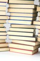 a stack of books on a white background photo