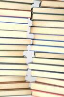 a stack of books on a white background photo