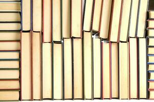 a stack of books on a white background photo