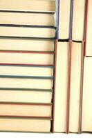 a stack of books on a white background photo