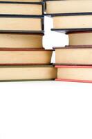 a stack of books on a white background photo