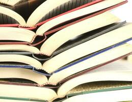 a stack of books on a white background photo