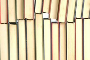 a stack of books on a white background photo