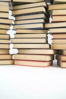 a stack of books on a white background photo
