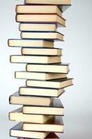 a stack of books on a white background photo