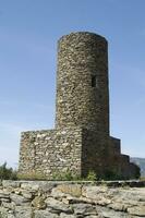 a tall stone tower photo