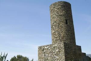 a tall stone tower photo