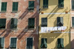 clothes hanging on the windows to dry photo