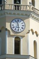 a clock on a building photo