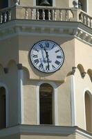a clock on a building photo