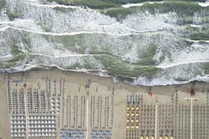 The equipped beach of Versilia seen from above photo