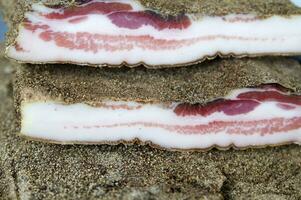 a close up of a piece of bacon photo