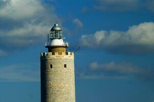 a tower with a light on top of it photo