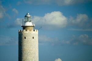 a tower with a light on top of it photo