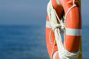 two life preservers on a beach photo