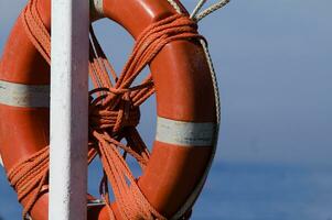 two life preservers on a beach photo