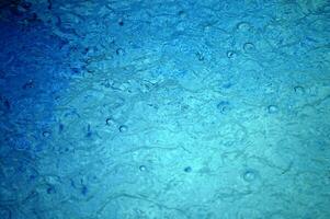 blue abstract background with water droplets photo