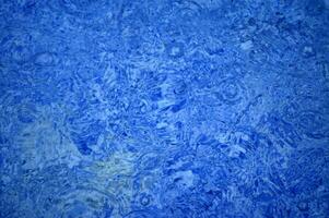 blue abstract background with water droplets photo