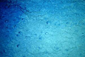 blue abstract background with water droplets photo