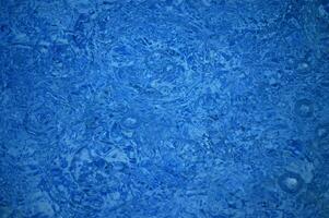 blue abstract background with water droplets photo