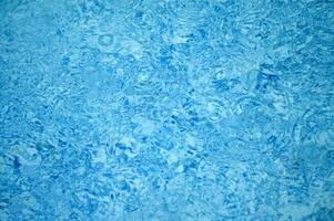 blue abstract background with water droplets photo