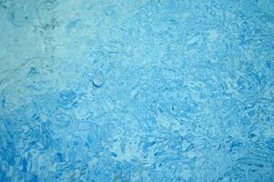 blue abstract background with water droplets photo