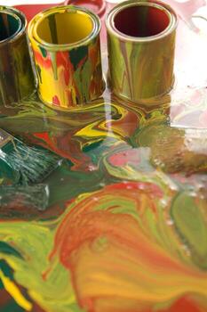 a close up of two tubes with paint on them photo