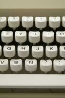 a close up of a typewriter keyboard with the letters oop photo