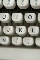 a close up of a typewriter keyboard with the letters oop photo