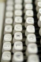 a close up of a typewriter keyboard with the letters oop photo