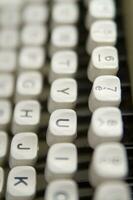 a close up of a typewriter keyboard with the letters oop photo