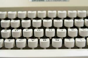 a close up of a typewriter keyboard with the letters oop photo