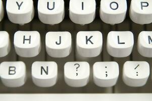 a close up of a typewriter keyboard with the letters oop photo