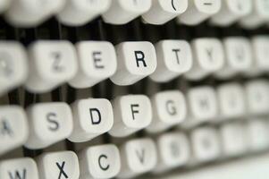 a close up of a typewriter keyboard with the letters oop photo