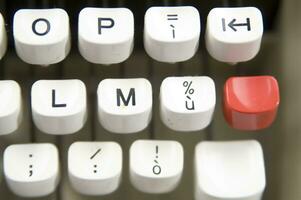 a close up of a typewriter keyboard with the letters oop photo