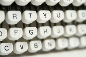 a close up of a typewriter keyboard with the letters oop photo