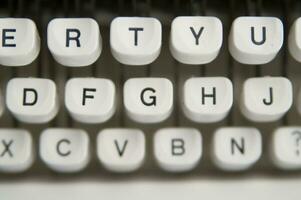 a close up of a typewriter keyboard with the letters oop photo