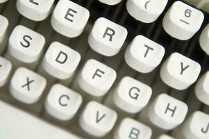 a close up of a typewriter keyboard with the letters oop photo