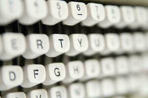 a close up of a typewriter keyboard with the letters oop photo