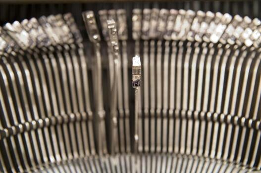 a close up of a typewriter keyboard with the letters oop photo